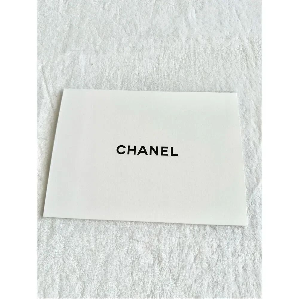 Chanel black-and-white sleeve cover